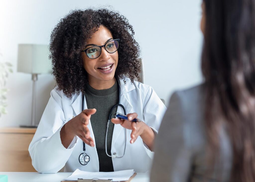 Healthcare professional in discussion with a patient